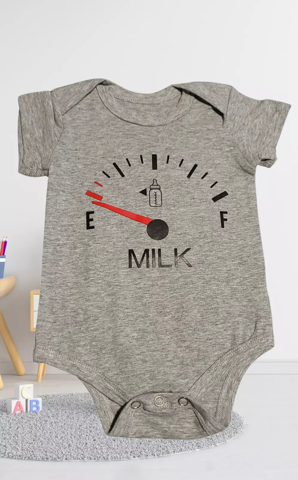 On Empty Milk Gauge Baby Bodysuit